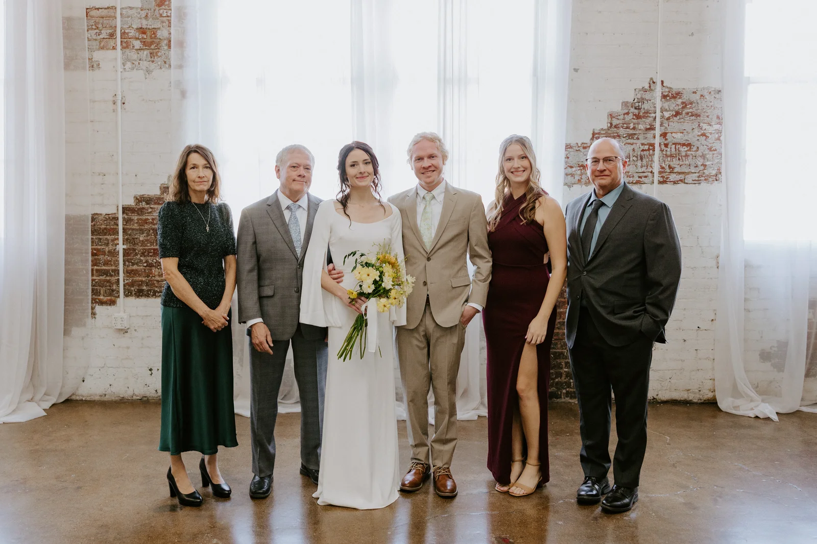 Family portrait with couple and parents — Marin & Chandler wedding at 24 Shelby