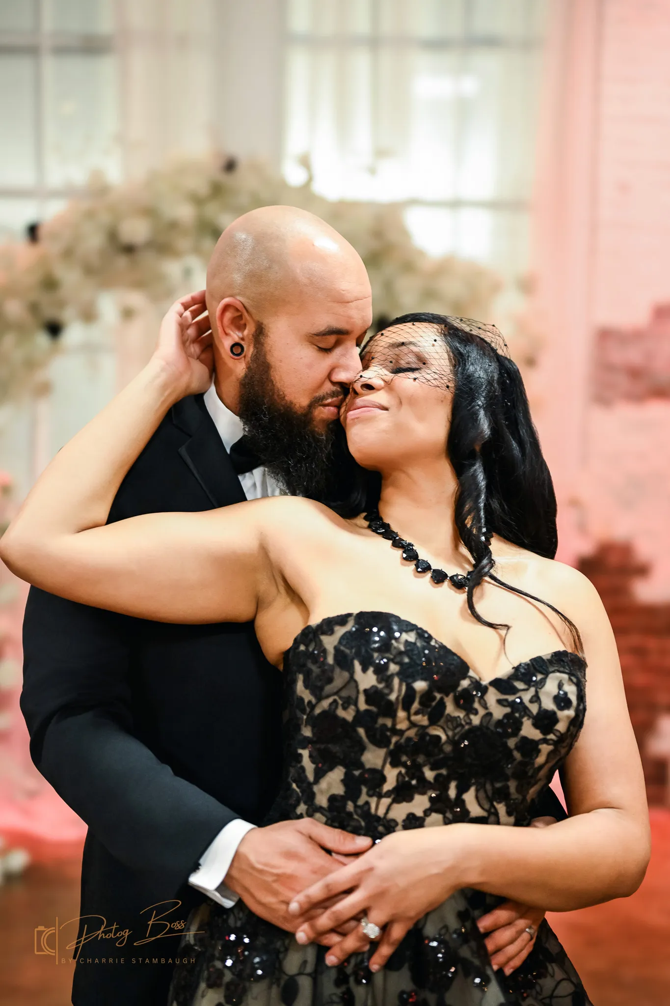 Wedding couple by exposed brick at 24 Shelby